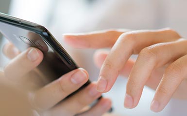 Close-up of a person using a cellphone