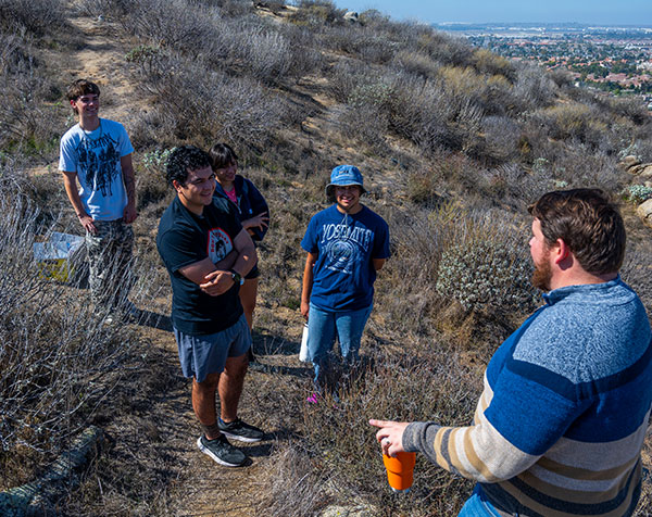 Environmental science students on a nature hike behind the MVC campus