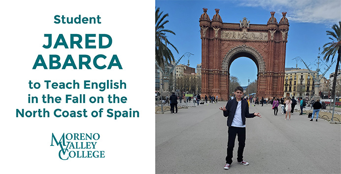 Jared Abarca, student, stands in front of monument in Spain
