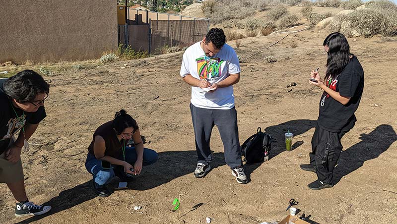 Four MVC students do fieldwork, researching ants