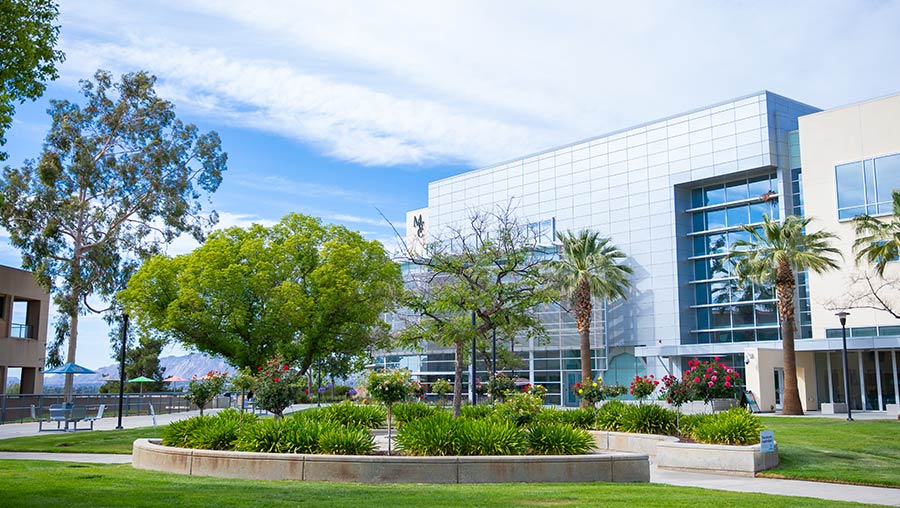 Photo of the Student Academic Services building across Coudures Plaza