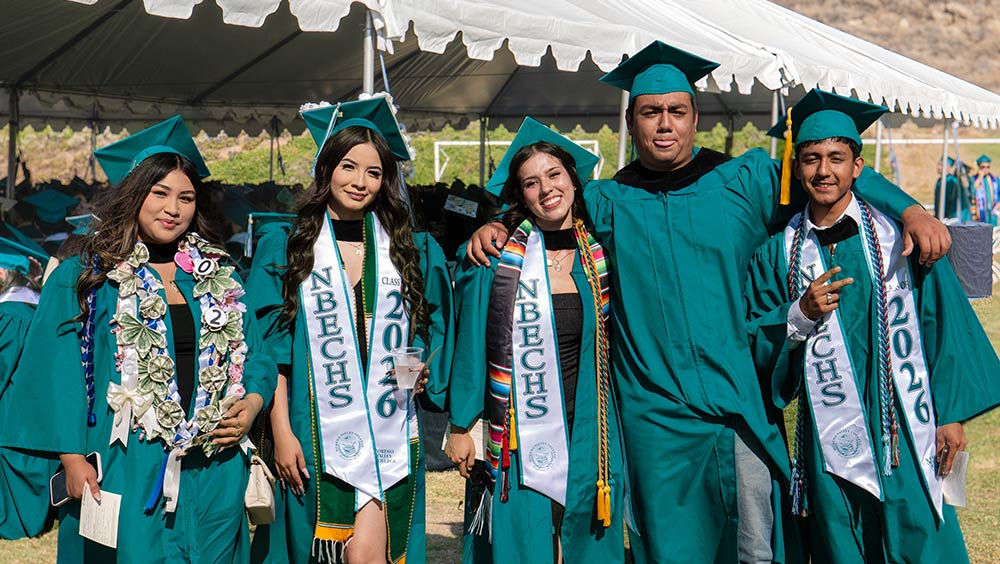 Middle College High School students pose for a photo before the ceremony