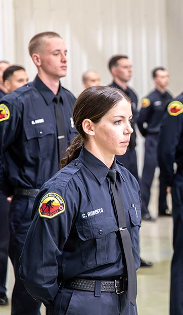 A fire academy cadet at their graduation
