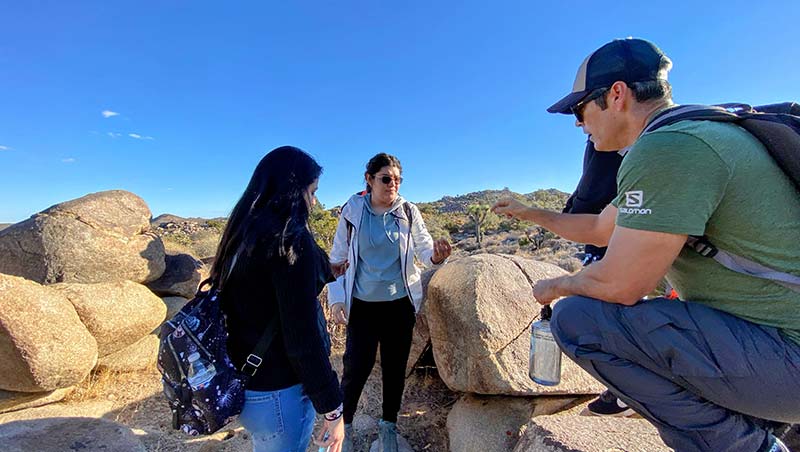 Students evaluate local flora in Joshua Tree National Park with Professor Felipe Galacia, Biology